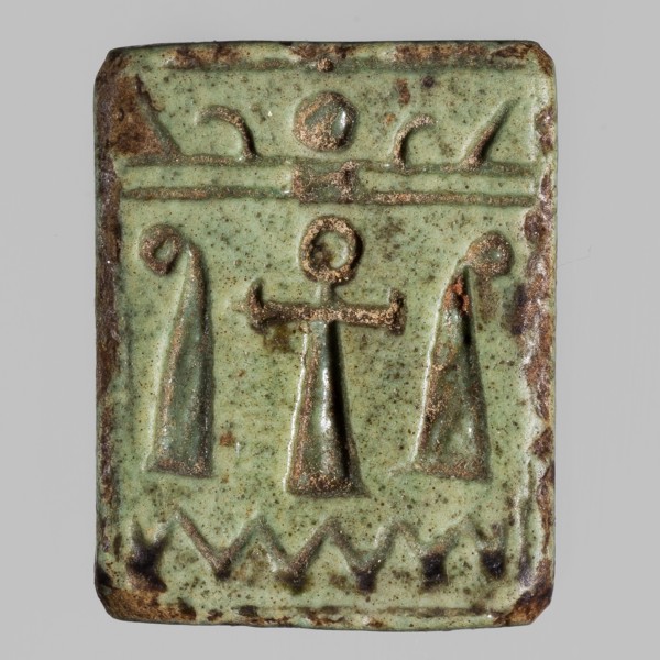 Amulet plaque with the head of the goddess Hathor;, Hathor myth, Egyptian deity; plaque amulet with