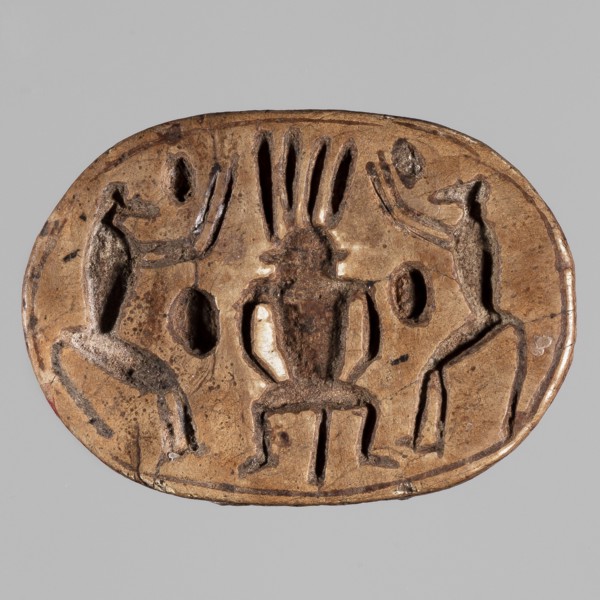 Scarab with a depiction of two baboons adoring Bes; on the reverse, a convex image of a scarab