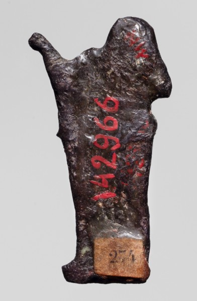Amulet — goddess Seshat;, Dark brown glass; Ptolemaic Period, 332–30 BC, Egypt. Depicts Seshat
