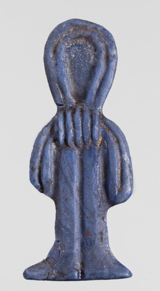 Amulet - tit;, Protective amulet in the shape of a tit knot, made of dark blue glass, with