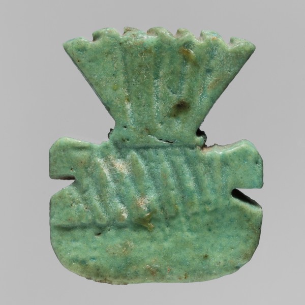 Amulet plaque with the head of the god Bes, amulet in the form of a plaque with a relief depiction