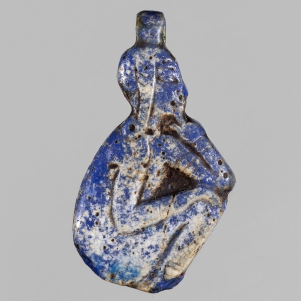 Amulet - god Horus-child; maker, figure with tucked legs and a finger to the mouth; Horus myth.,