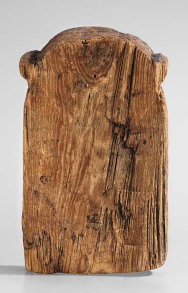 Magical stele topped with the mask of the god Bes. Magical stele cippus depicting in the lower
