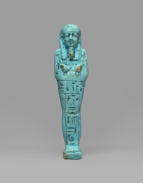 Ushabti Wahibre-em-achet. Mummy-shaped funerary figurine shabti made of blue faience with black