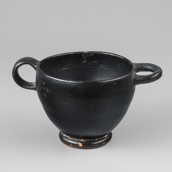 Black-finished skyphos, Type B. Thin-walled skyphos with a deep bowl and annular foot. One handle