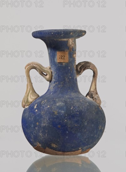 Amphora, bulging belly with a rounded bottom, long cylindrical neck with a thick ring-shaped rim;