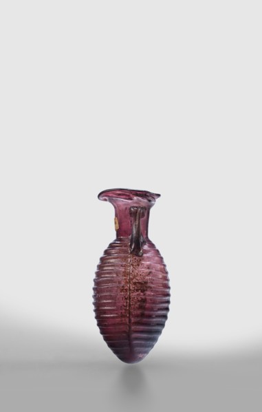 Amphora, unknown eastern workshop; Translucent, manganese glass; elongated ovoid body with