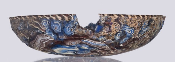 Bowl, Egyptian workshop. Mosaic glass bowl with flat bottom; walls widen evenly toward the top then