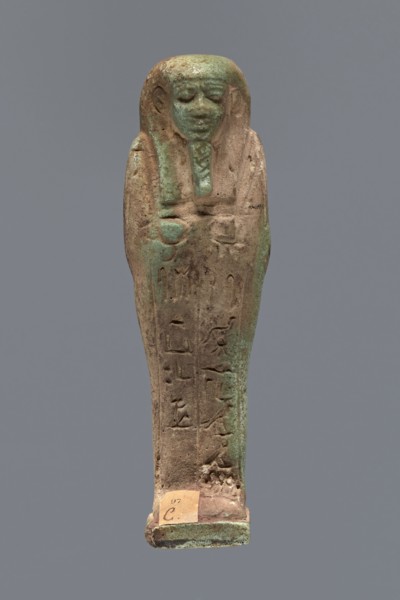 Ushabti, Hor-em-saf ca. 664–525 BC. Mummy-shaped figurine made of green faience. Stocky build,