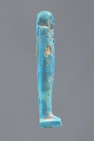 Ushabti, Mummy-shaped figurine made as grave goods, standing on a base with the back supported by a