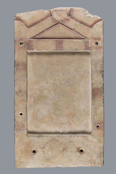 Stela Alexis, Small limestone stele with simple architectural decoration. Recessed epigraphic field