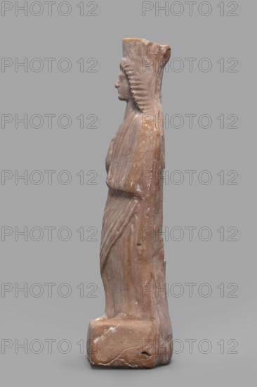 Figurine of a woman with a polos on her head, unknown Boeotian workshop; female figurine, 475–450