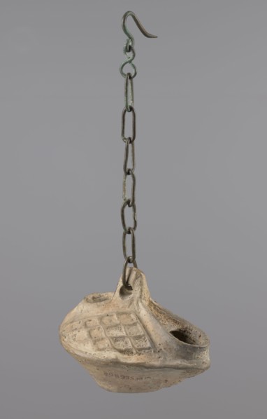 Lamp, Egyptian Coptic art, antiquity; oval oil lamp made of yellow-gray clay with a high container