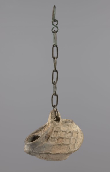 Lamp, Oval lamp made of yellow-gray clay with a high container and two handles, through which a