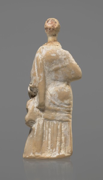 Terracotta figurine of a standing woman, terracotta, female figurine, himation, chiton, Tanagra