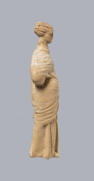 Terracotta figurine of a standing woman, terracotta, female figurine, himation, chiton, Tanagra