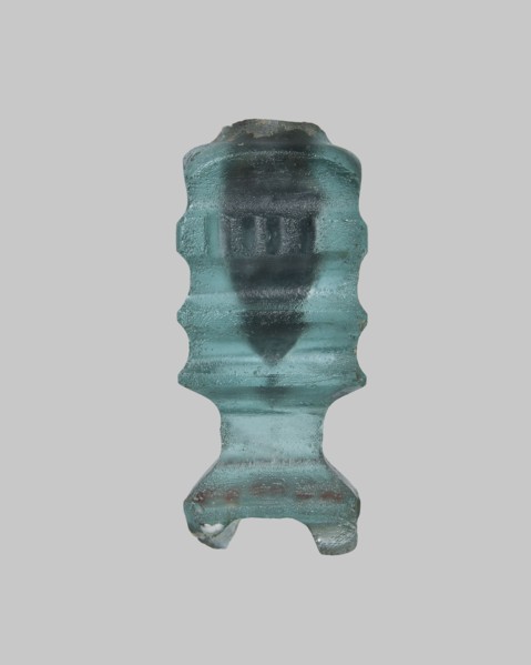 Cosmetic bottle, Islamic, Arabic culture. Thick-walled blue glass vessel with one convex band