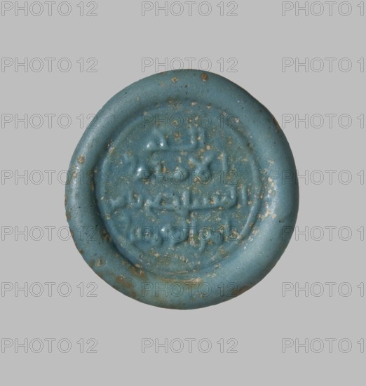 Coin weight with an impression of a seal containing the name of Caliph Al-Mustadi, Islamic art,