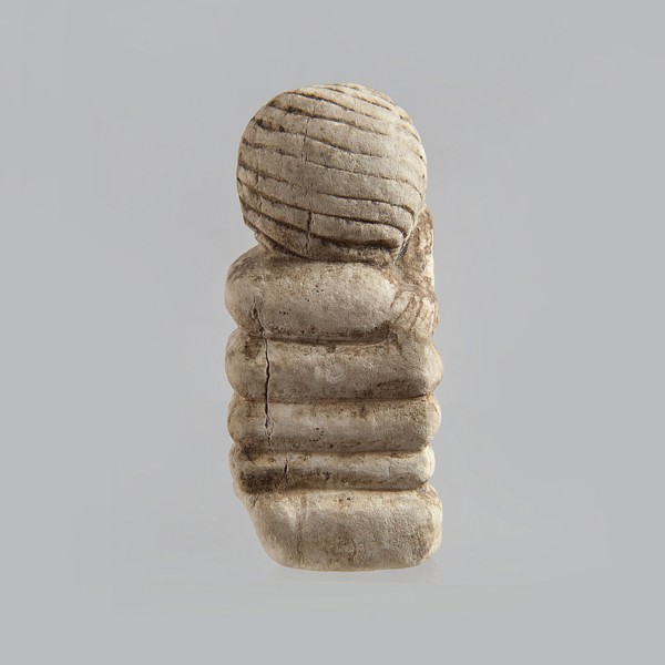 Fragment of a figurine. Head of a polychrome figurine, which originally probably depicted a woman