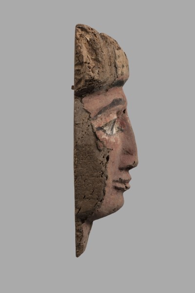 Sarcophagus mask with a partially preserved fragment of a wig above the forehead painted yellow