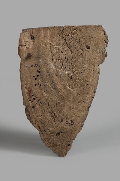 Sarcophagus mask with a partially preserved fragment of a wig above the forehead painted yellow