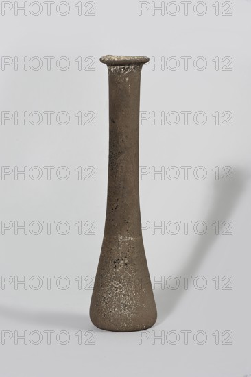 Bottle; maker, 1st century BC–1st century AD; Egypt; vessel., A tall, narrow ceramic vessel with a