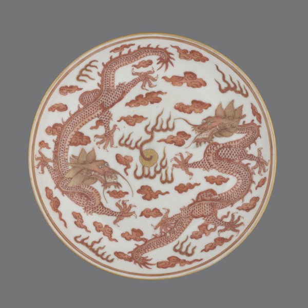 Plate., Porcelain dish decorated in the mirror and on the outer wall with a pair of dragons with a