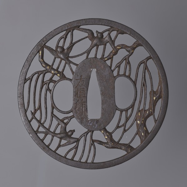 Crossguard tsuba by Nakai Tomotsune II. Early 18th century Edo period, 1603–1868. Iron round tsuba