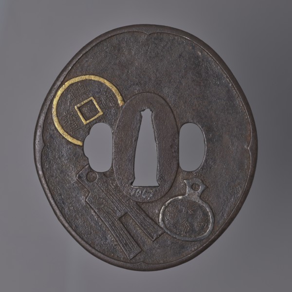Crossguard tsuba, Umetada school; maker: Umetada Shigeyoshi. Oval tsuba tatemaru gata with a