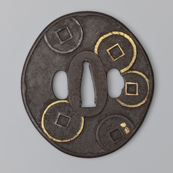 Crossguard tsuba, Umetada school; maker: Umetada Shigeyoshi. Oval tsuba tatemaru gata with a