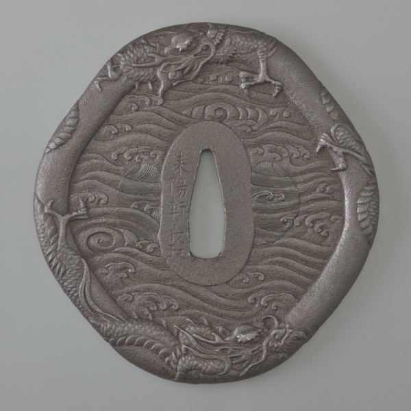 Crossguard tsuba, Raiyôken, Yoshimasa maker, sword crossguard in the shape of an otafuku chubby