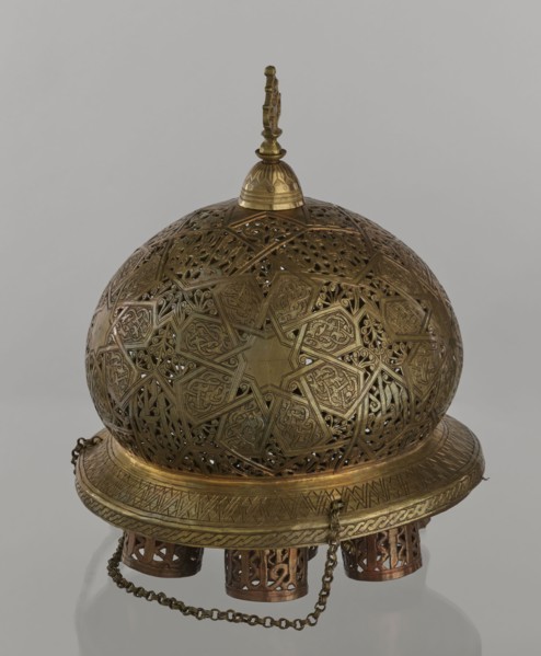 Lamp, Islamic art, Arabic culture; metal oil lamp with Arabic inscriptions and geometric ornament.