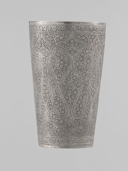 Mug, Mughal period, 19th century, North India probable. Silver mug densely decorated with plant and