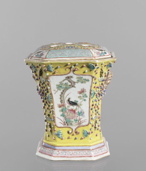 Vase with a lid; ceramics; colored porcelain; openwork perforated flat lid; decorated with flowers,