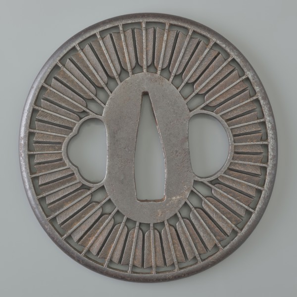Crossguard tsuba, Tsunetada maker, Japanese, Edo period 19th century. Round tsuba maru-gata with a
