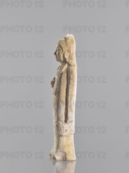 Figure of a standing woman — funerary figurine; creator, sculptor: Krieg doctor author; images of