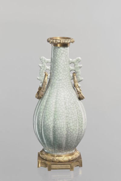 Vase; Chinese; Qing 1644–1911; 19th century. Celadon ceramic decorative vessel — slender vase with