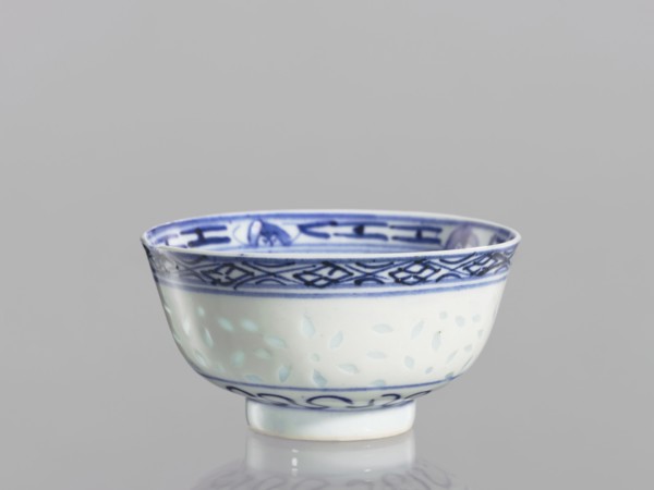 Bowl, Chinese, Qing dynasty 1644–1911, 18th–19th century. Blue-and-white porcelain bowl on a low