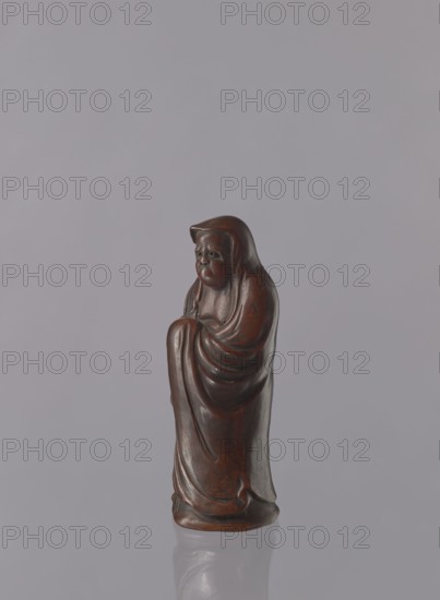 Daruma, Japanese, Meiji period 1868–1912. Ceramic figurine of Daruma Buddhist monk, male figure in