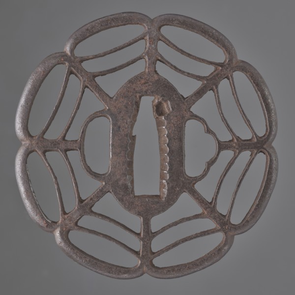 Crossguard tsuba, Tomotsugu; Japanese, Edo period 1603–1868, 19th century, Japan. Openwork tsuba