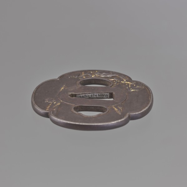 Crossguard tsuba, sword crossguard, landscape motifs depicting fishermen, bridges, rocks, and