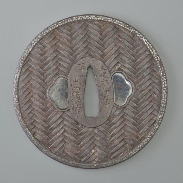 Crossguard tsuba, maker: Tômei, unknown provenance; Japanese Edo period, Bunka era 1809. Iron tsuba