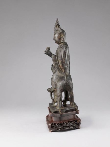 Buddhist deity on a buffalo on a base; figurine; Chinese; lotus iconography; Chinese Buddhism; Qing