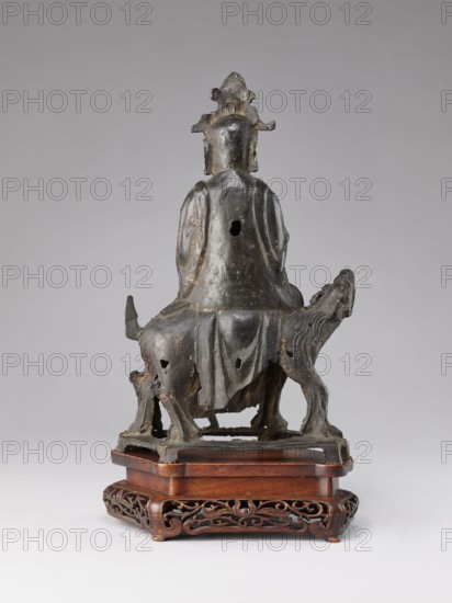 Buddhist deity on a buffalo on a base; bronze sculpture, Chinese, Qing 1644–1911, 19th century;