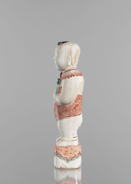 One of the Hehe Er Xian brothers holding a vase with lotus buds, Chinese, Qing dynasty, Kangxi