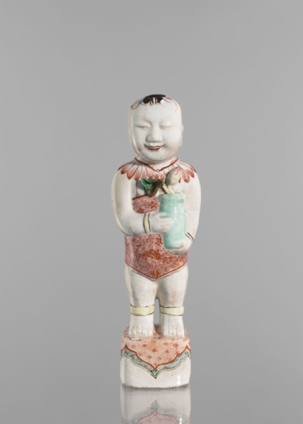 One of the Hehe Er Xian brothers holding a vase with lotus buds, Chinese, Qing dynasty, Kangxi