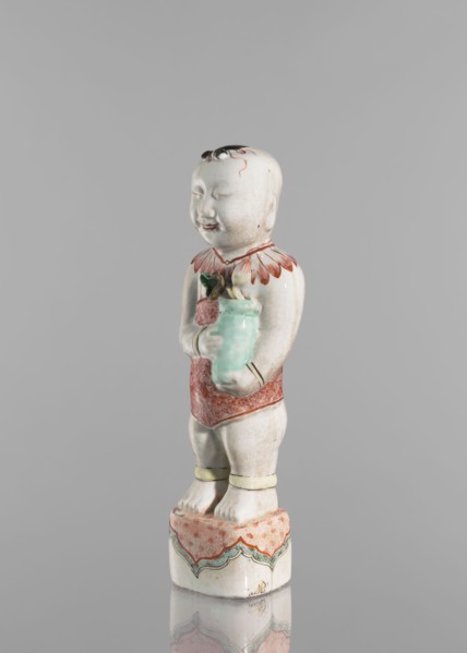 One of the Hehe Er Xian brothers holding a vase with lotus buds;, Chinese, Qing dynasty, Kangxi