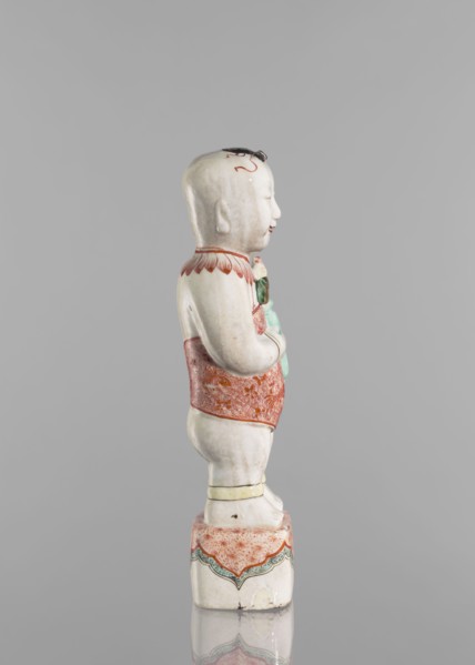 One of the Hehe Er Xian brothers holding a vase with lotus buds; maker, Chinese; Qing dynasty,