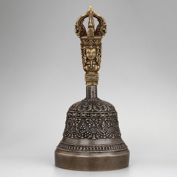 Bowl with a lambrequin border with mascarons. Handle with a bust of a Bodhisattva carrying a vajra.