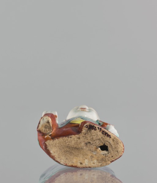 Boy with ruyi — incense burner., Chinese; colored porcelain; Ming; 19th century; subject: boy